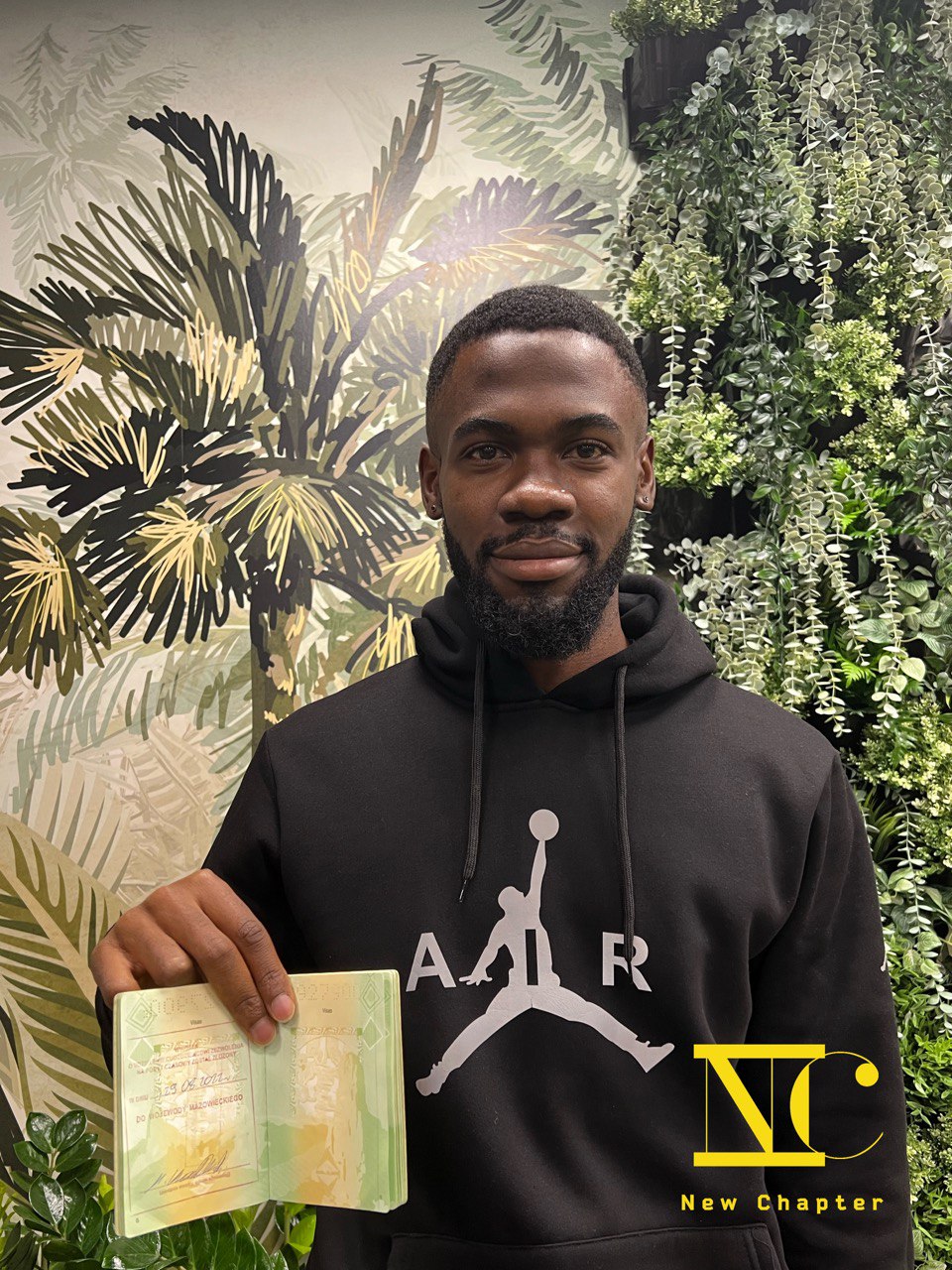 Happy client showing his Polish residence visa stamp